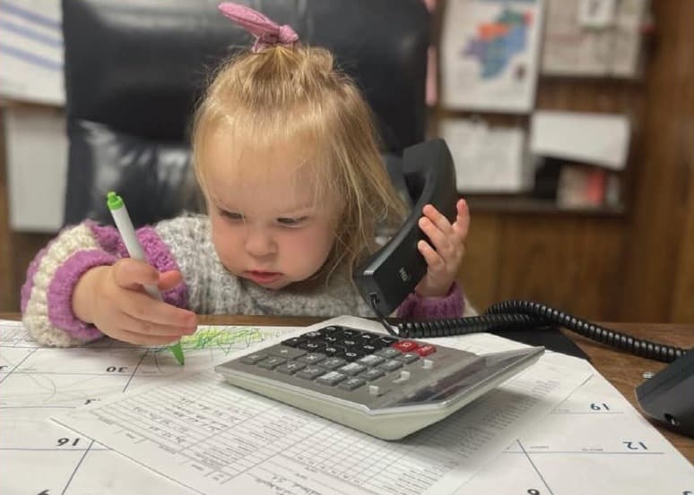 Waverly at the office desk