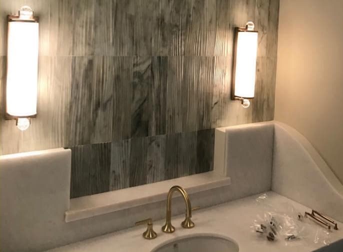 Bathroom vanity sconces and finishes