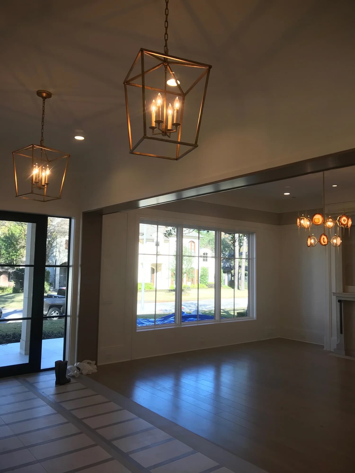 Entry lantern fixtures with lights on